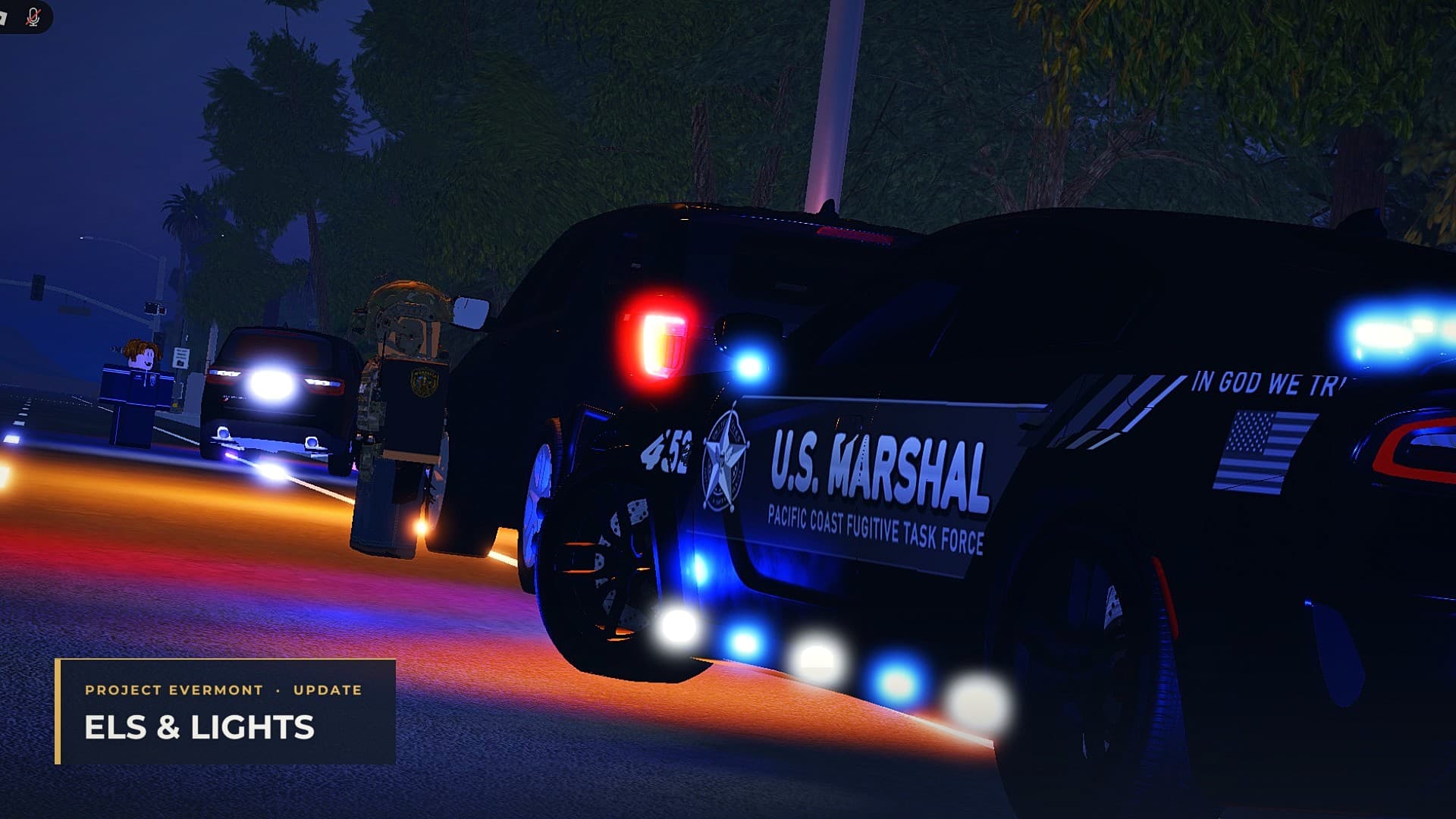 U.S. Marshal cars on a night stop with their lights running