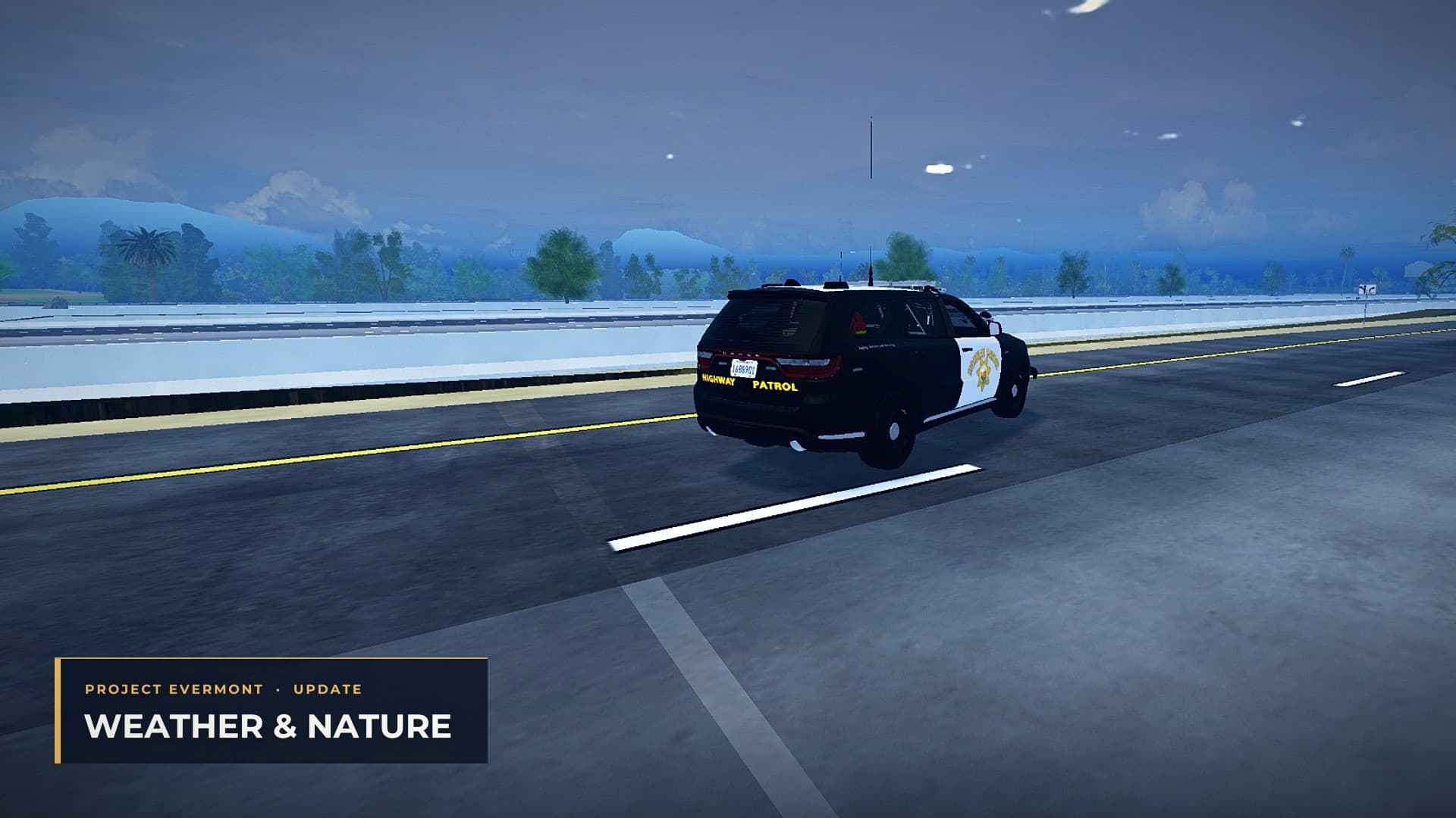 A CHP Durango on a wet highway in a storm