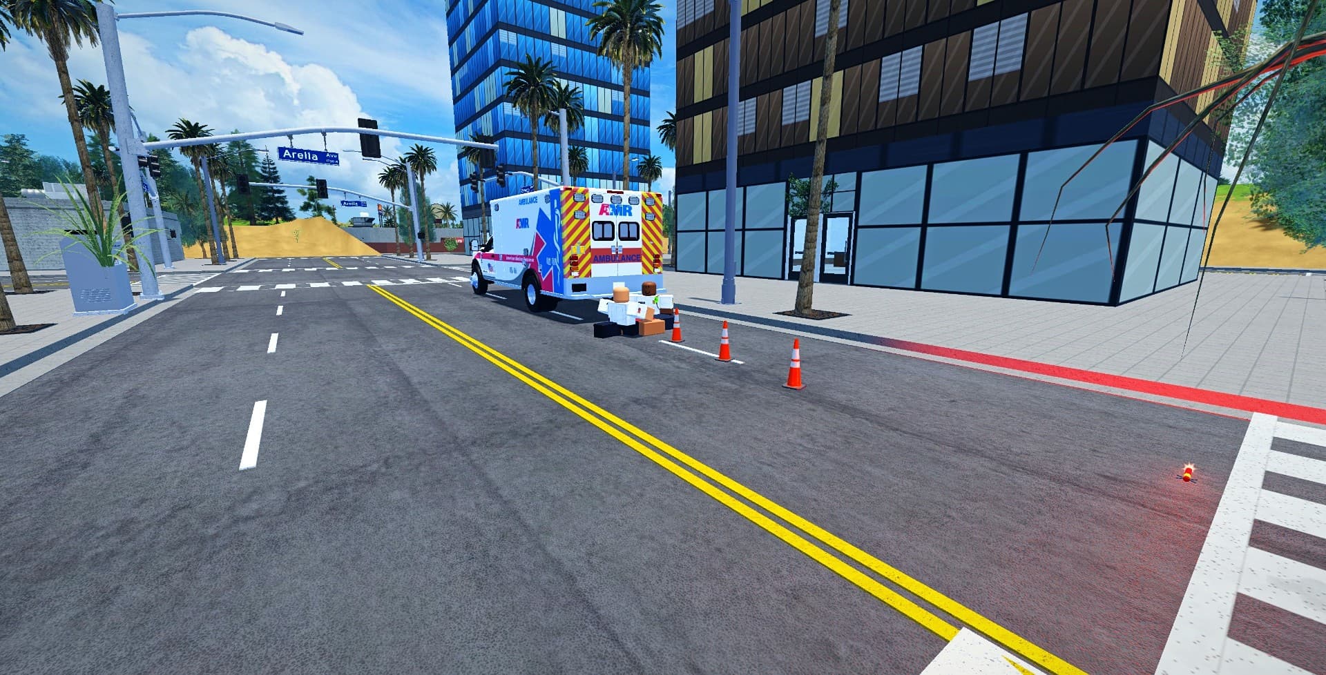An AMR ambulance at the curb with two medics treating a patient